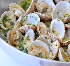 Cooking clams in a pan