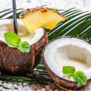 Closeup of fresh pinacolada drink served in a coconut