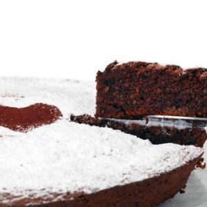 A typical italian cake torta caprese made of chocolate and almonds